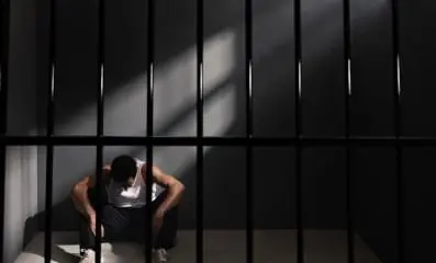 Man in jail.