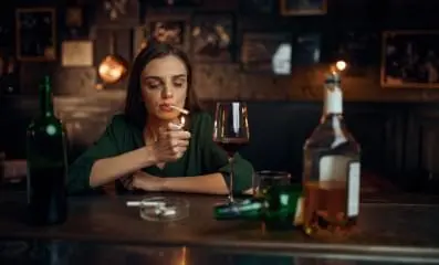 Woman at a bar.