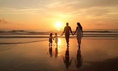 family walking on beach.