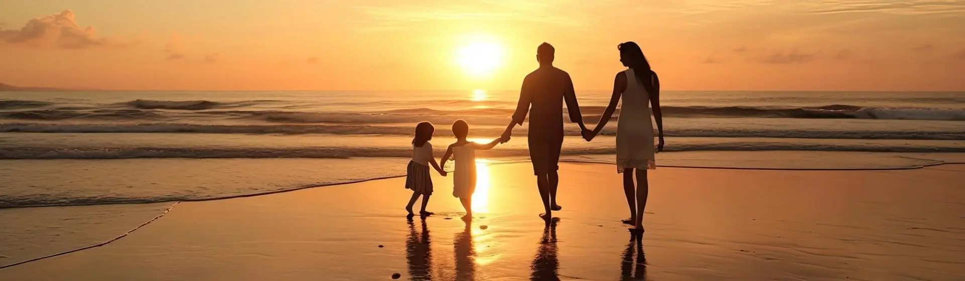 family walking on beach.