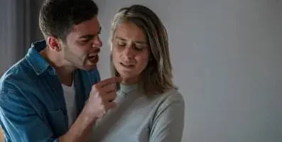 Husband yelling at wife.