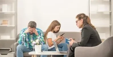 Therapist with parent and child.