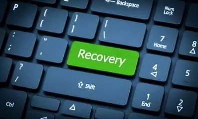 key board with a green key that says recovery.