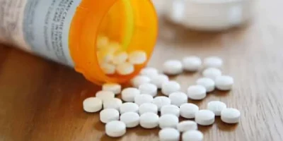 pills scattered on table.