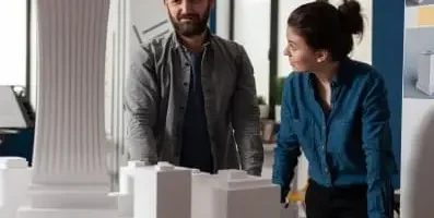 Man looking proud as woman looks at him
