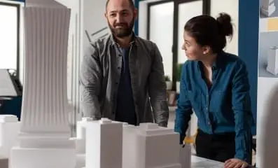 Man looking proud as woman looks at him