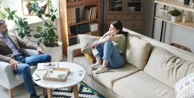 woman speaking to therapist