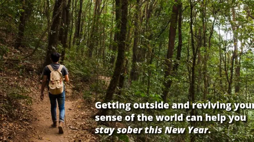 man hiking in a trail