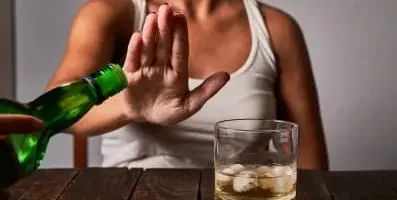 Woman rejecting alcohol