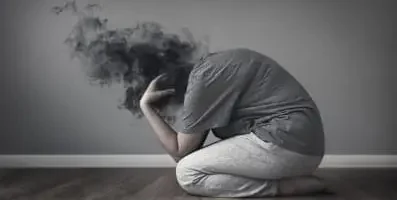 frustrated woman on ground.