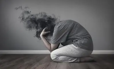 frustrated woman on ground.