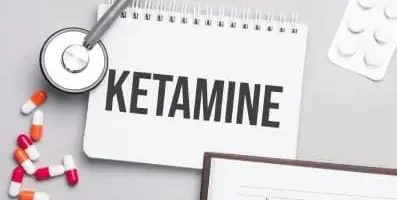 Note book with the word ketamine written