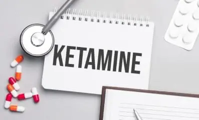 Note book with the word ketamine written