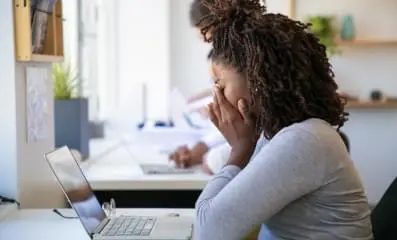 depressed woman Infront of laptop