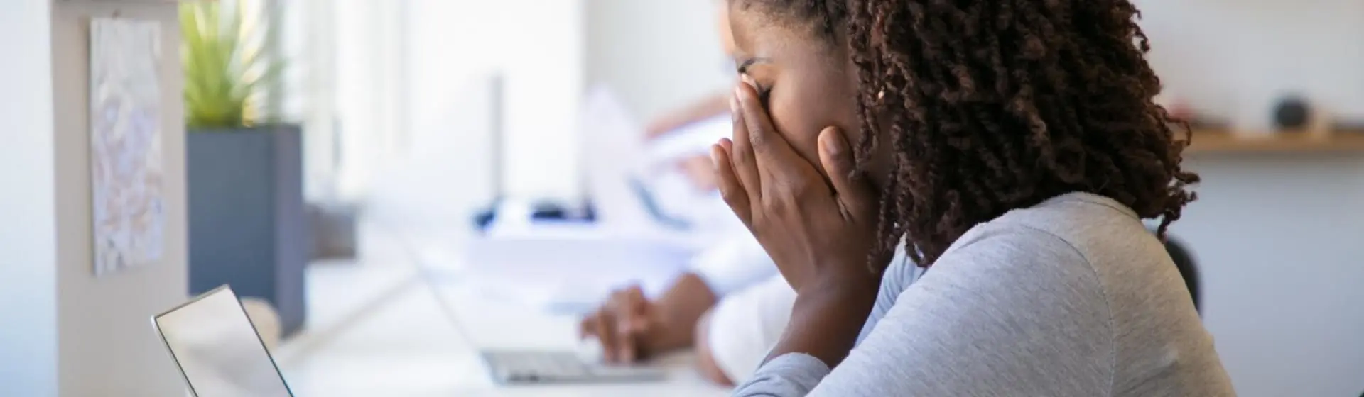 depressed woman Infront of laptop