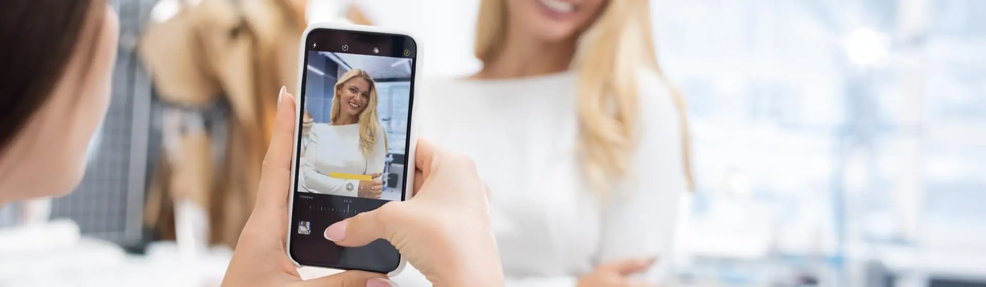 Woman recording a Tik Tok video