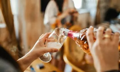 Alcohol is not classified as a stimulant; it is a depressant that slows down the central nervous system, leading to a sedative effect.