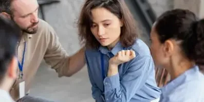 Woman with drug addiction being helped by therapist