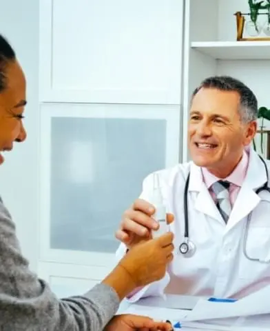 patient speaking with doctors.