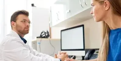 Doctor speaking with patient.