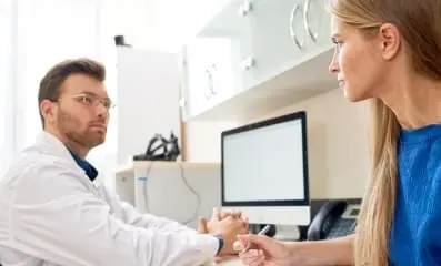 Doctor speaking with patient.
