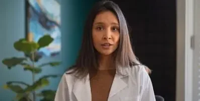 Nurse practitioner talking about comprehensive care for lasting recovery.