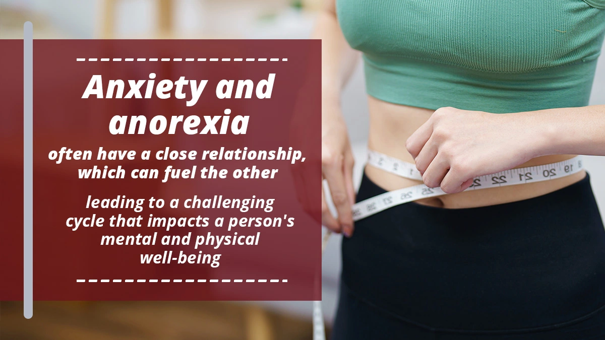 Text on a red background reads Anxiety and anorexia often have a close relationship, which can fuel the other, leading to a challenging cycle that impacts a person's mental and physical well-being. Next to the text, there is an image of a person in a green crop top measuring their waist with a tape measure.