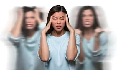 Woman in blue shirt with various emotions, representing bipolar disorder. White text on red background explains bipolar disorder is genetic.