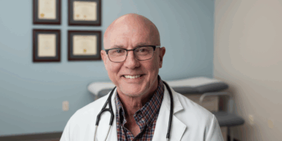 Psychiatrist Dr Kane in his medical room