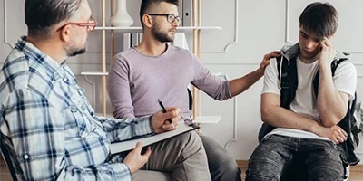 A group of man at therapy.