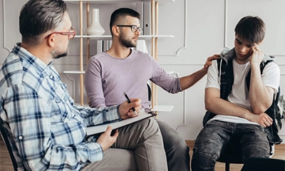 A group of man at therapy.