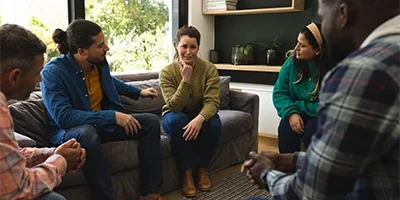 Image of a therapy session highlighting a holistic approach to mental health recovery through mindfulness, nature therapy, and emotional healing.