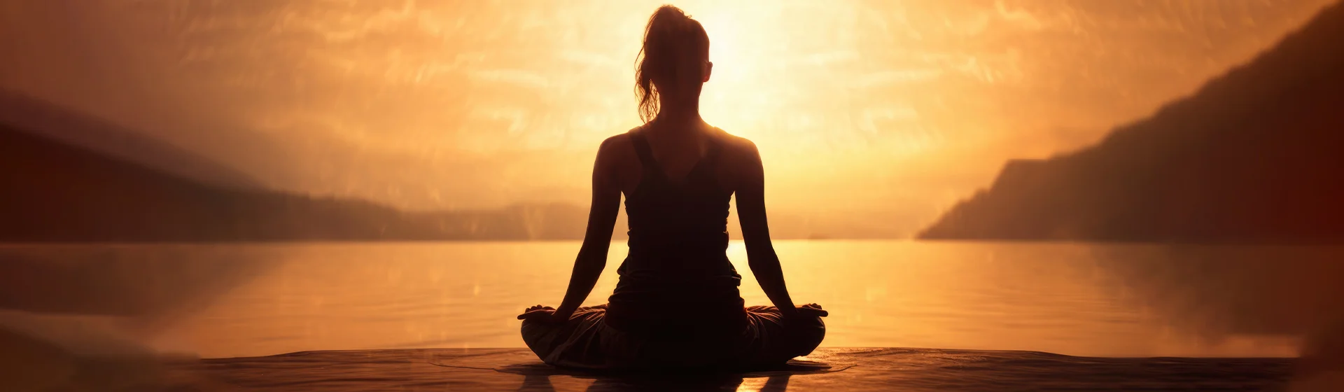 woman meditating on a beach