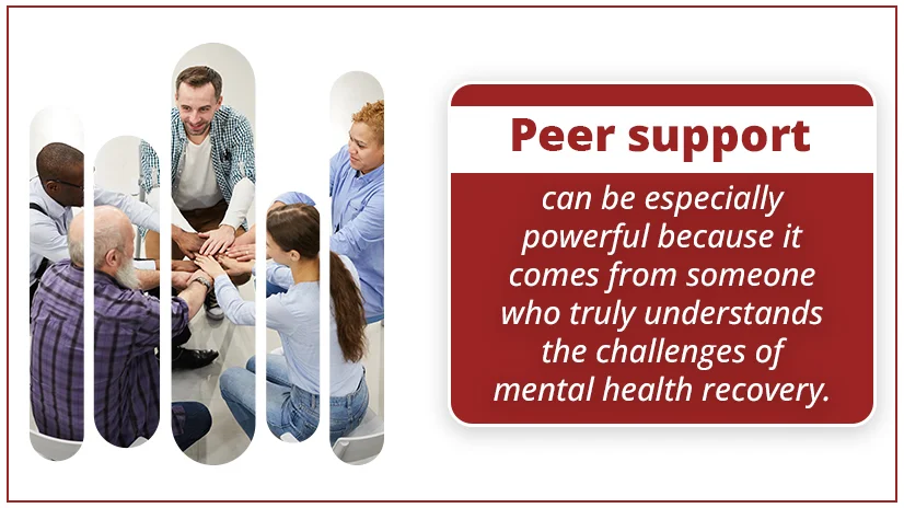 A person in a group therapy getting consoled by the other members