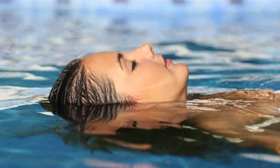 woman in water therapy, floating on water