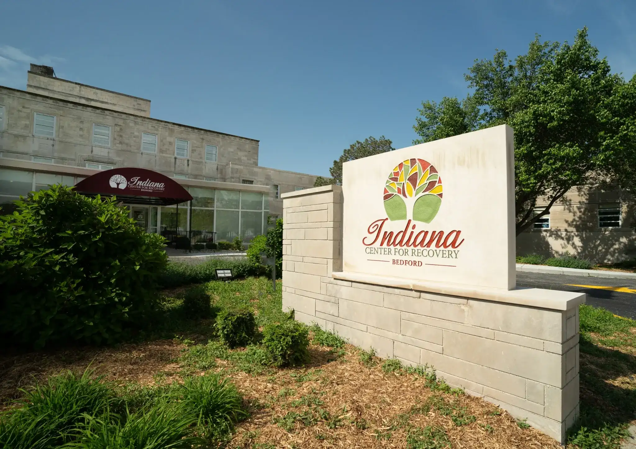 Indiana Center for Recovery Bedford exterior sign and entrance outside the treatment facility.