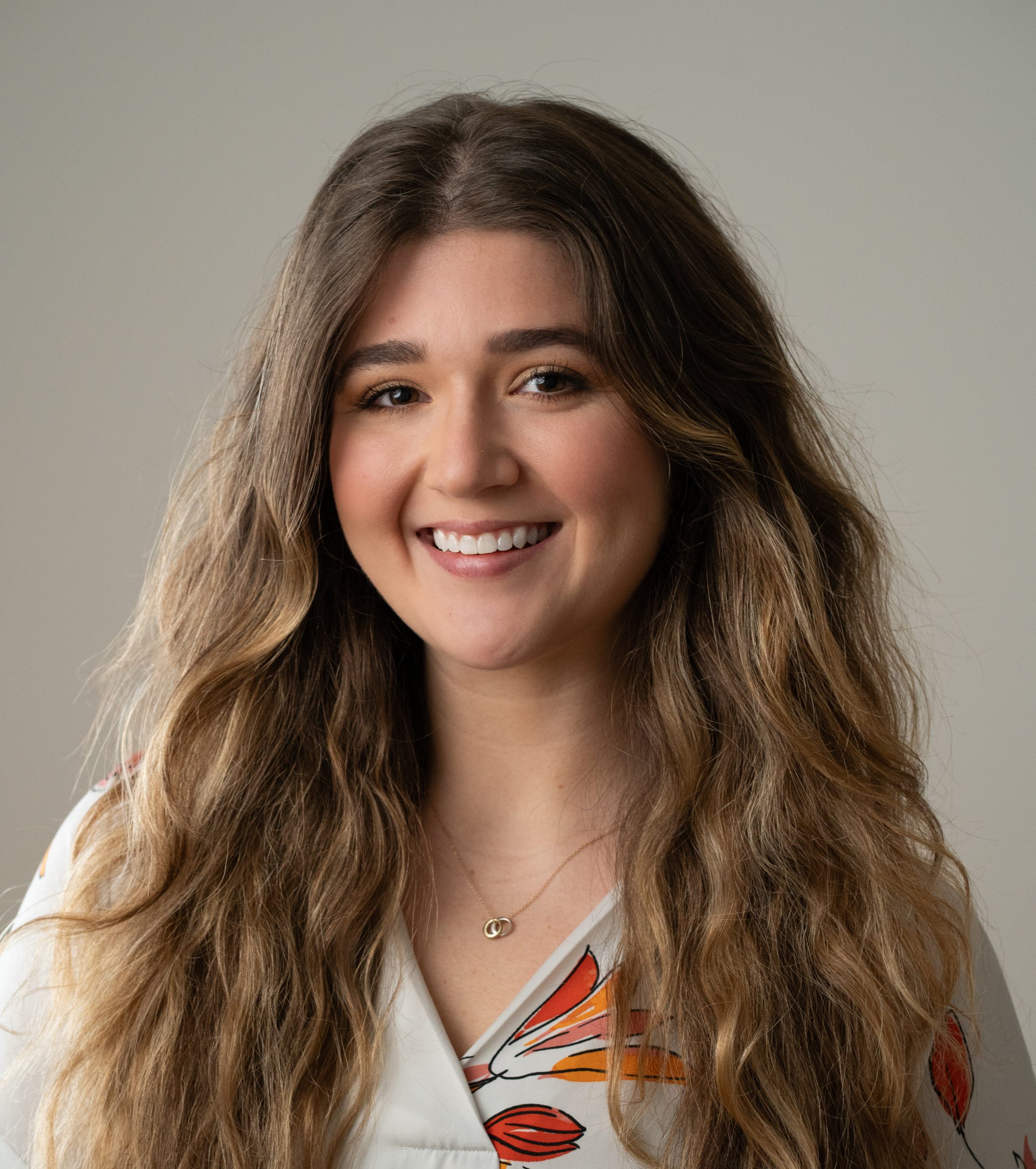 Lola Mahner, staff member at Indiana Center for Recovery, smiling in a professional headshot.