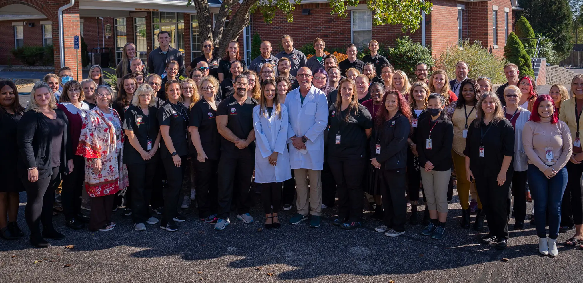 a group of people posing for a photo