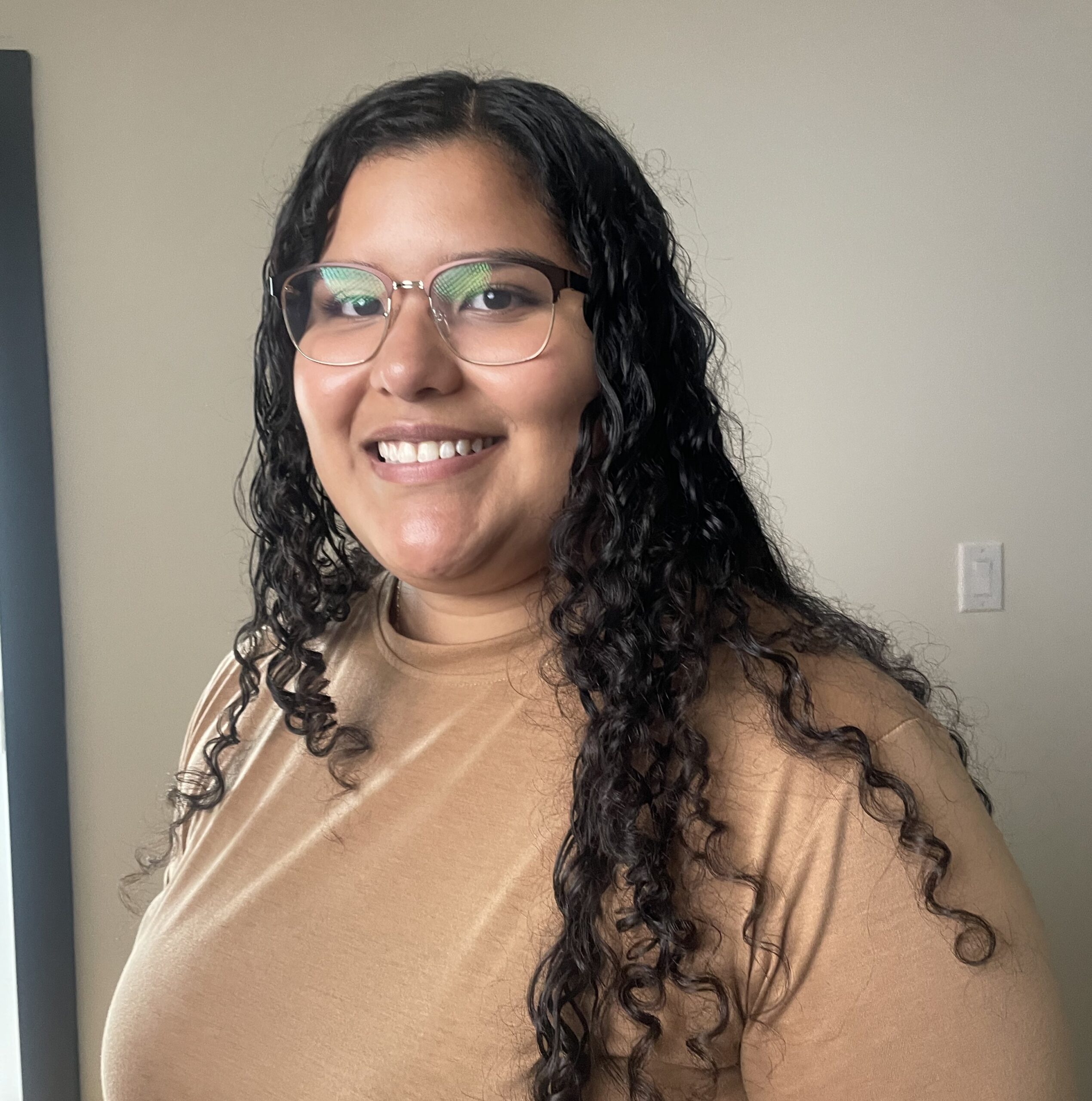 a woman smiling at the camera