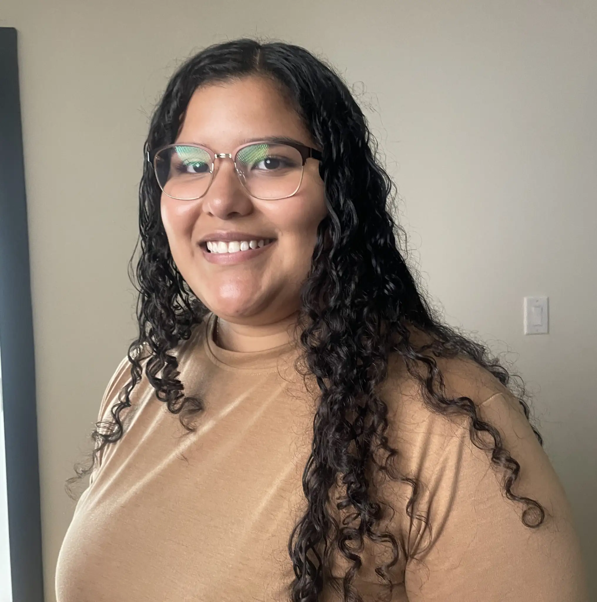 Joangely Hernandez, staff member at Indiana Center for Recovery, in a professional headshot.