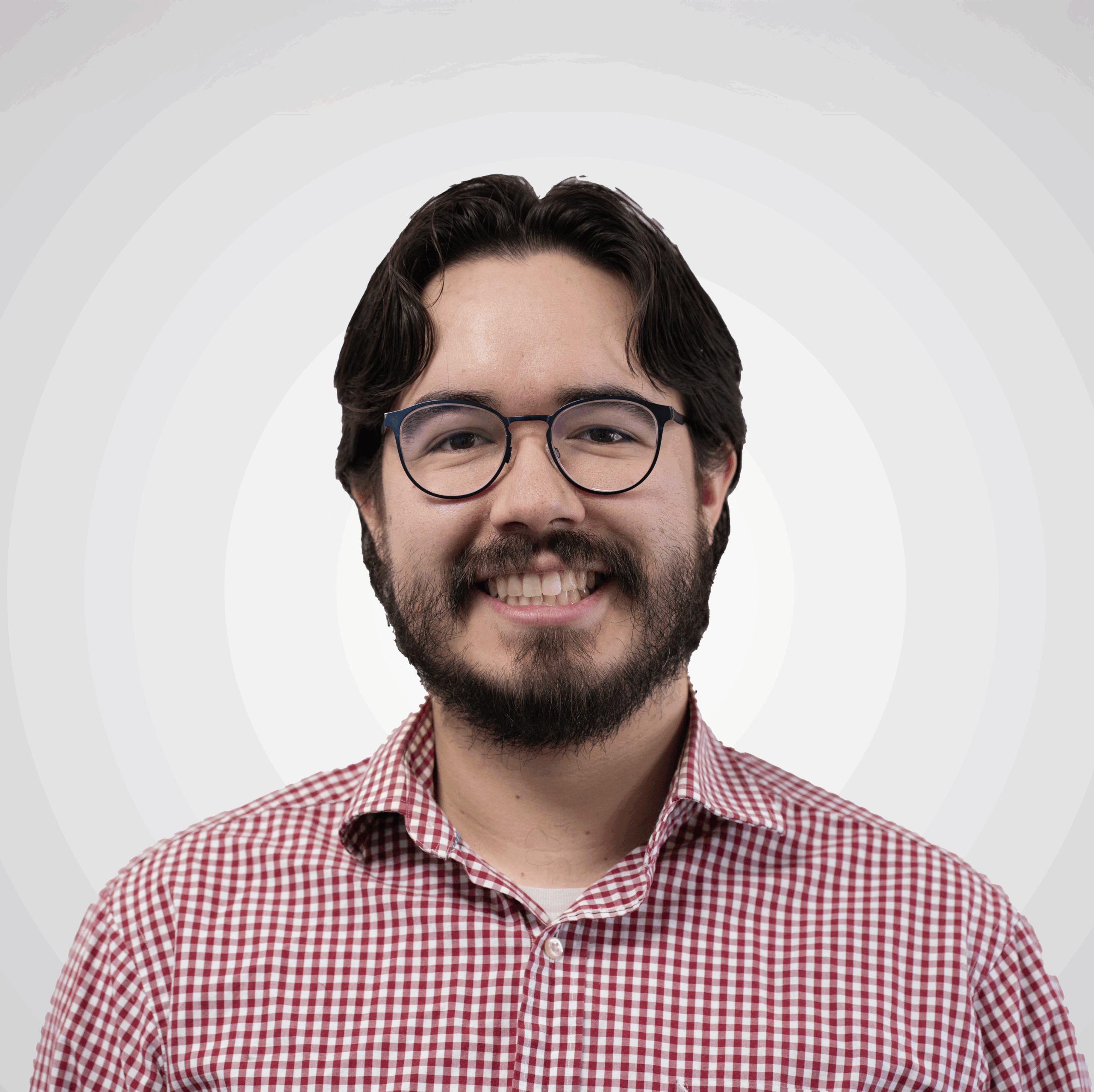 A therapist wearing a red and white button up